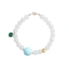 A single-loop bracelet made of white jade and Hetian jade, 999 gold coins, turquoise, meander beads, hanging dry green, and peace pendant for women Item Picture